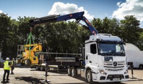 Mercedes Actros with crane and drawbar trailer 80 tonnes at work